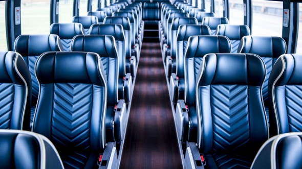 new bedford 54 passenger charter bus rental